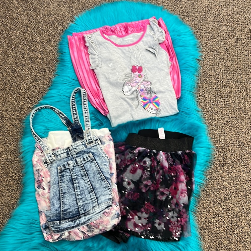 2 girls dresses size 14//16 and one skirt size 16.